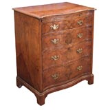 Antique Georgian walnut serpentine chest with brush slide