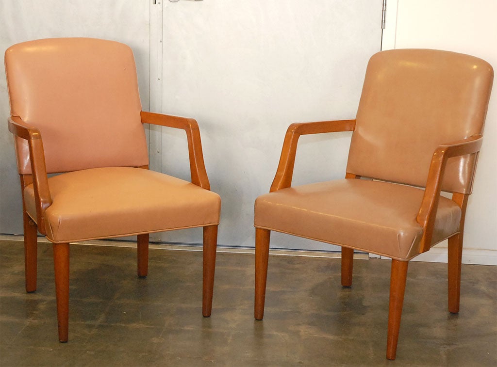 A pair of arm chairs probably from the 1940's. Both chairs are in good condition and would love a good home. Perhaps they will fit into your next setting. 