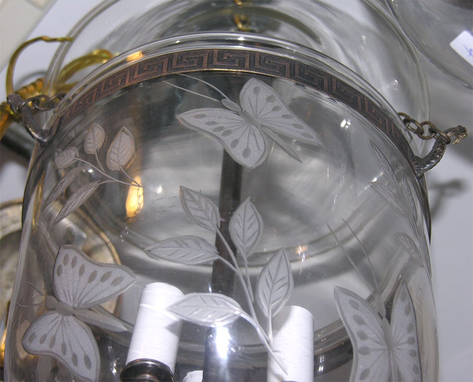 antique glass belljar with butterfly etchings