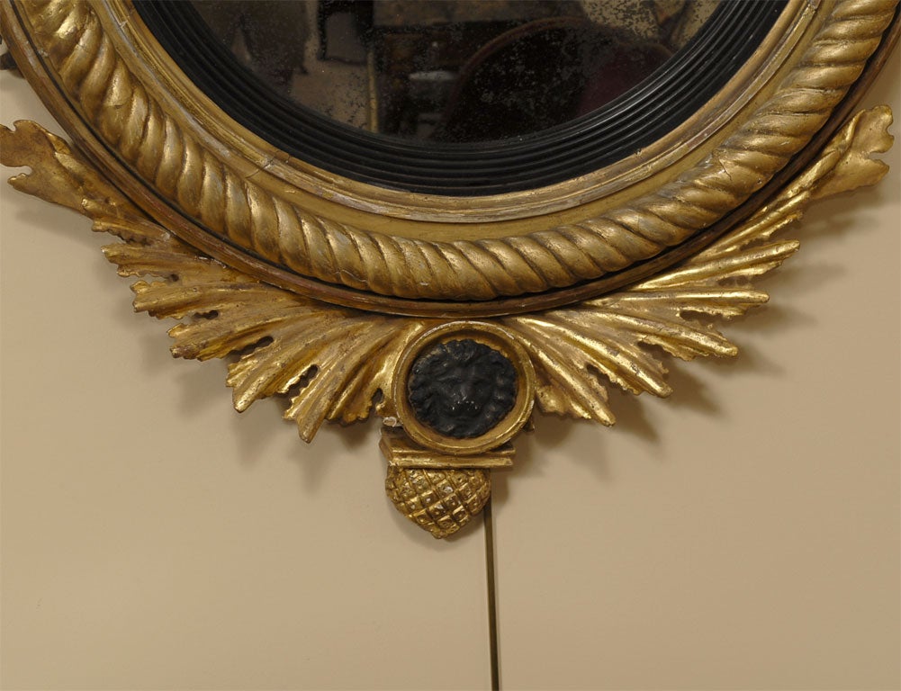 19th Century English Regency Black-Painted and Gilt Convex Mirror, c. 1820