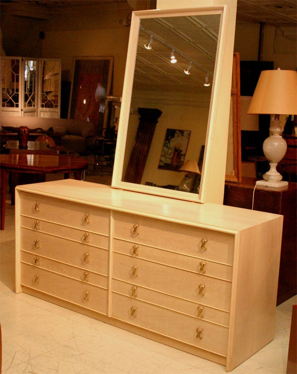 Paul Frankl chest of drawers with brass pulls.