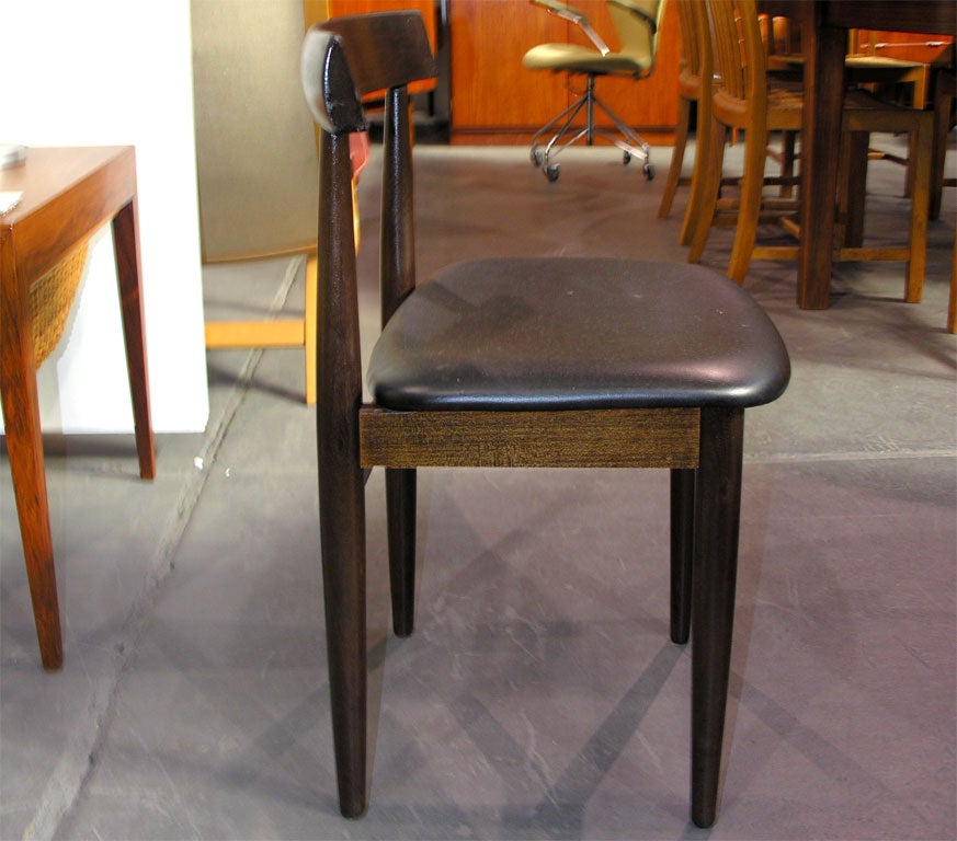 Rosewood Dining Table with Nested Dining Chairs by Hans Olsen In Excellent Condition In New York, NY
