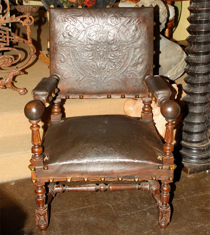BAROQUE STYLE HAND CARVED OAK ARMCHAIRS WITH EMBOSSED LEATHER AND NAILHEAD TRIM