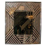 Square mirror with mirrored slat surround