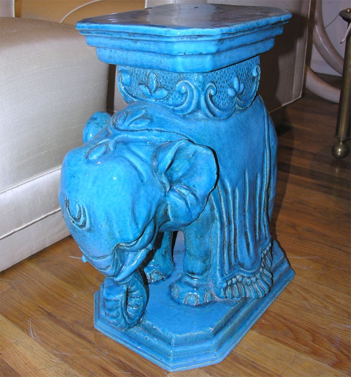 Pair of turquoise ceramic elephant form bases
