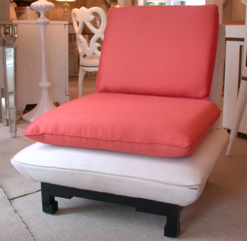 Beautiful pair of lounge chairs upholstered in coral and white silk with ebonized wood base, attributed to James Mont