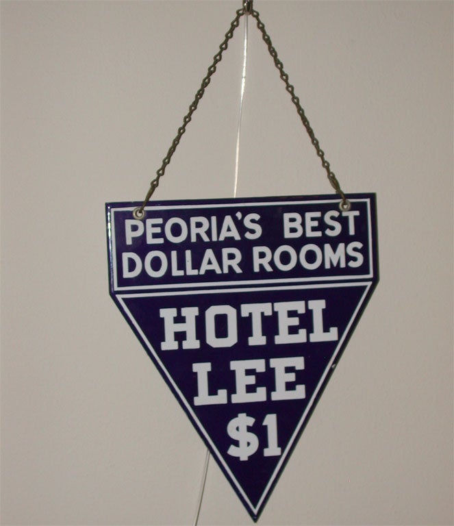 Rare and early five sided porcelain hotel advertising sign with original postcard attached to rear.
Postcard shows hotel building in Peoria, IL. The sign has the original hanging chain and is in fine condition.