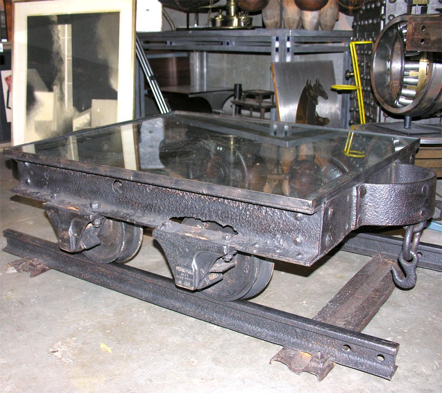 A great French coffee table created from industrial rail cart materials. Rolls on track!<br />
<br />
Tabletop: 48