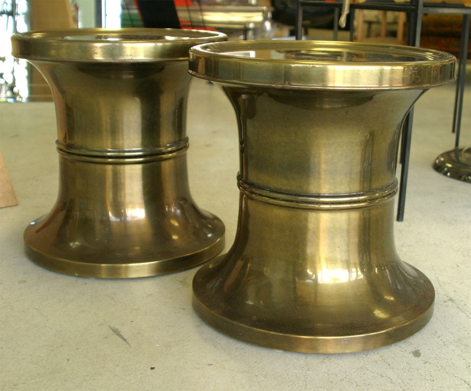 Chic pair of brass Mastercraft side tables.Could also be utilized as a pair of stools.