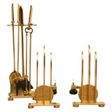 Brass Andirons and Fireplace  Set attributed to Donald Deskey