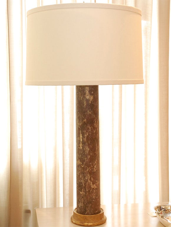 Early Roman marble columns mounted as lamps in France in the 1940s. Original gilding. French wired, rewired.