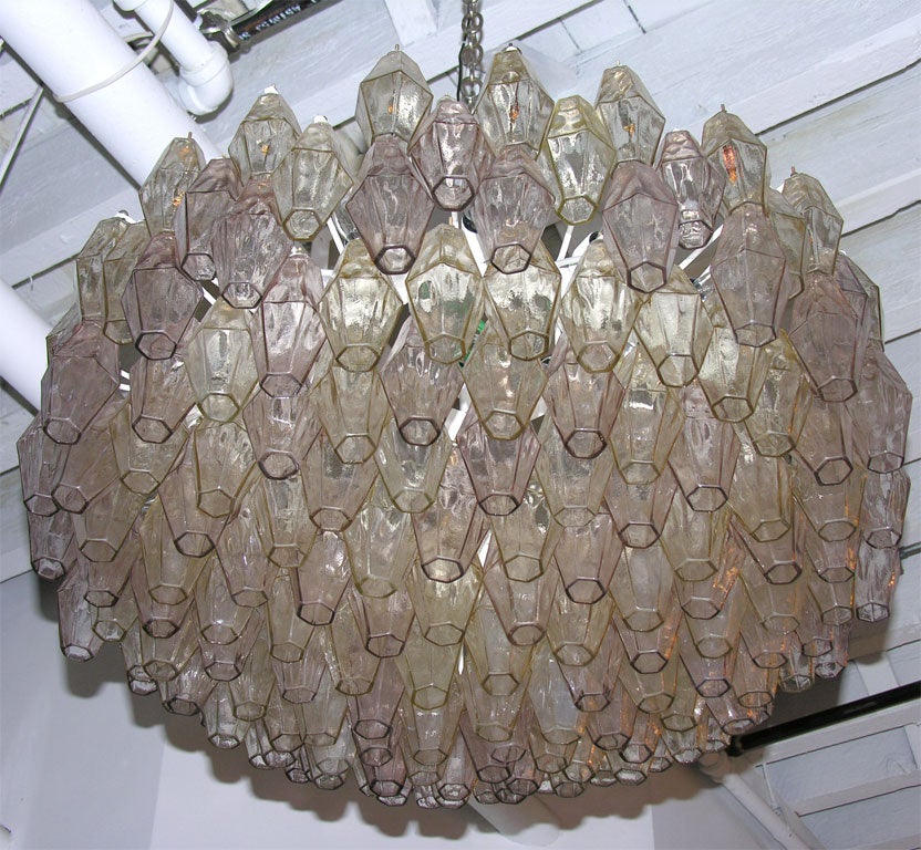 Elegant Italian Venini chandelier in champagne + cranberry colored glass with 160<br />
glass pieces, c. 1960.