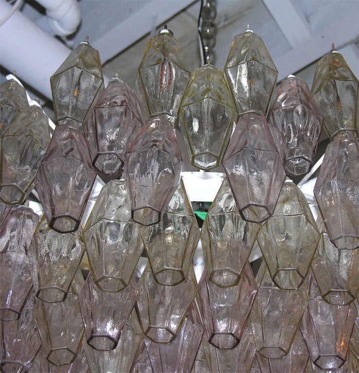 Glass Venini chandelier in champagne + cranberry colored glass