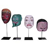 Assorted Painted wood masks of dancers on stands, circa 19 C.