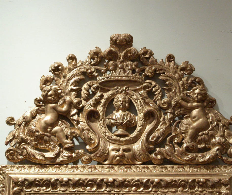 MIROIR MONUMENTAL EN BOIS DORÉ DE RÉGENCE ESPAGNOLE