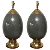 Pair of charcoal gray ceramic and brass egg lamps