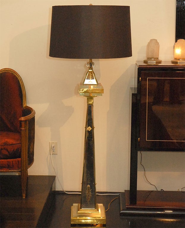 Gorgeous mirrored venetian floorlamp with black silk shade.<br />
Lights up from base and top. Can be lit either way with 2 separate switches.