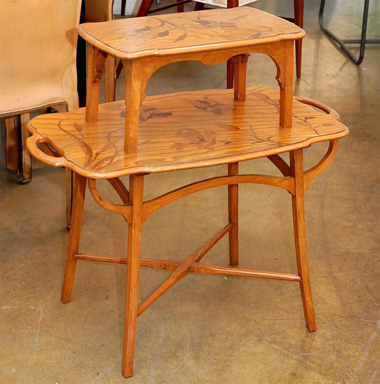 Art nouveau two tier marquetry side table.