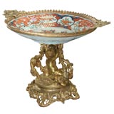 Antique porcelain corbeille on antique French brone stand.