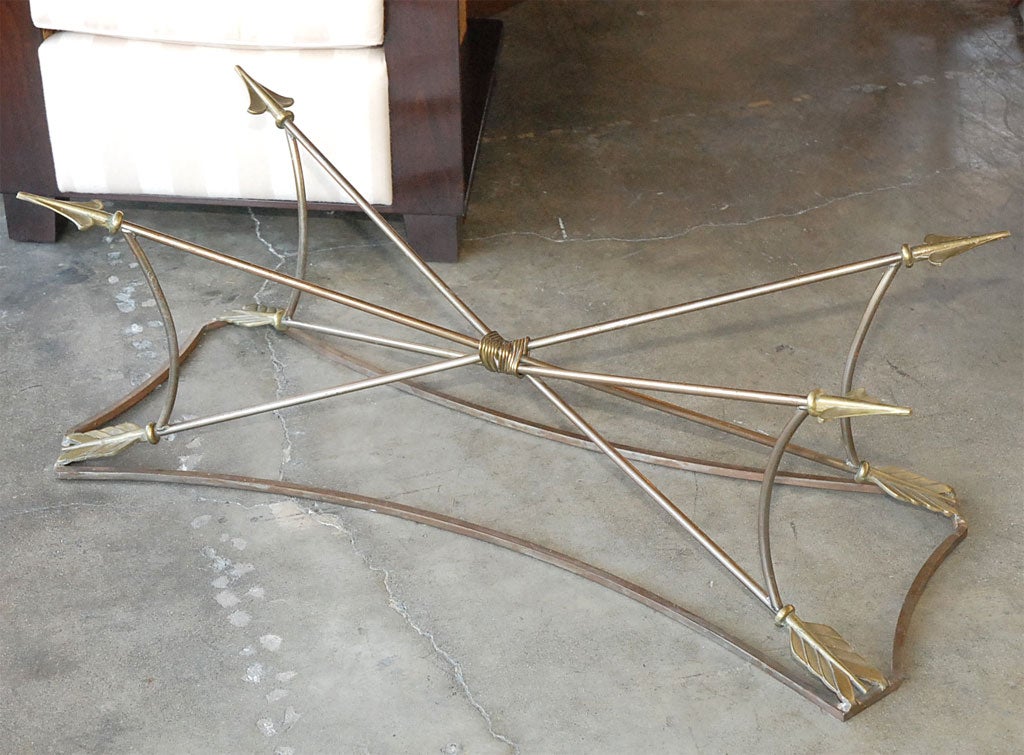 Neoclassical style "arrow" cocktail table base.