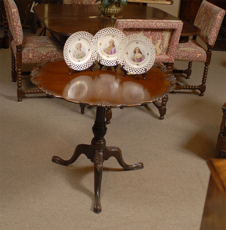 Set of 3 Sevre Portrait Lattice Plates with gold leaf borders.
Featuring 2 aristocrat Ladies and one Gentleman. Fleurs de Lis surrounding the hand painted portraits.  Note Sevre marking on reverse of plates.