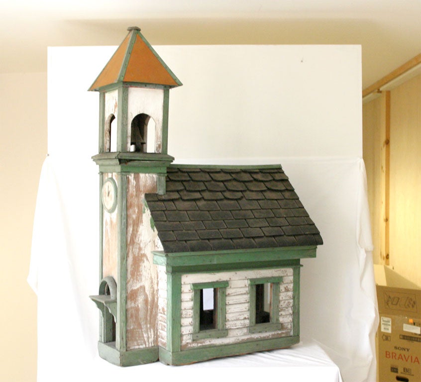 American Folk Art School House with bell in tower