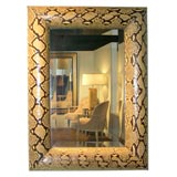 “Half Round Molding Mirror” covered in Python by Karl Springer