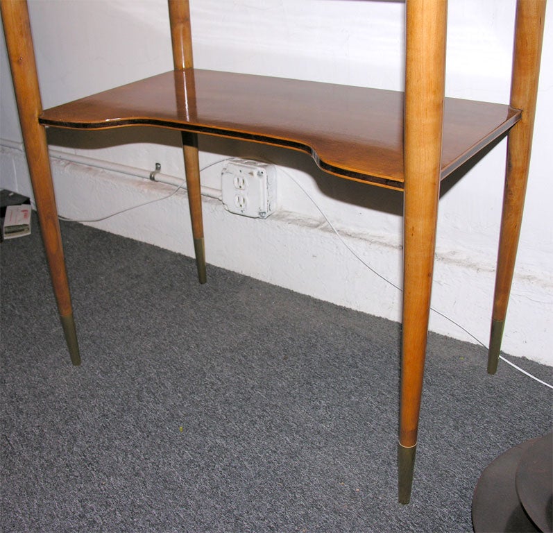 DELICATE BLOND SMALL LIQUER CABINET-BAR WITH ROSEWOOD INLAY,<br />
REAR MIRROR-LINED INTERIOR WITH 3 RACKS FOR GLASSES AND A WELL FOR BOTTLES. VERY UNUSUAL TO FIND SUCH A PETITE ITEM.