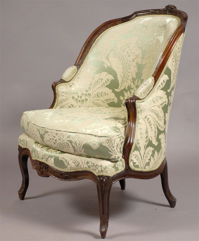 A very fine Louis XV period Bergere in walnut, dating from the mid-18th century, and stamped 