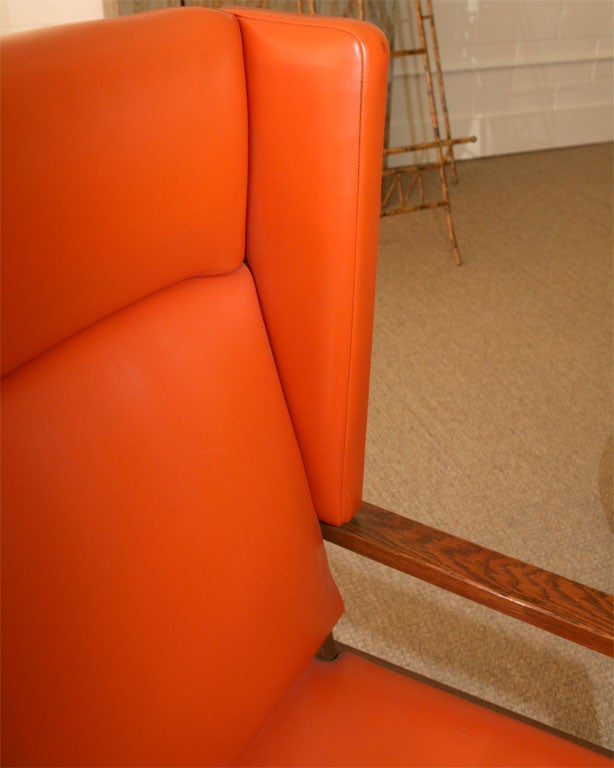 An Orange Swedish Wing Chair 5