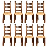 Vintage Set of 8 oak chairs, in the style of Charlotte Perriand