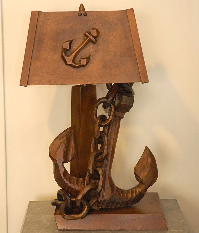 This table lamp with its boldly carved anchor and chain will make a great addition to any marine setting. Give it as a gift to that fisherman, boat owner, sailor or man of the sea....Jefferson West Antiques offer a large selection of decorative