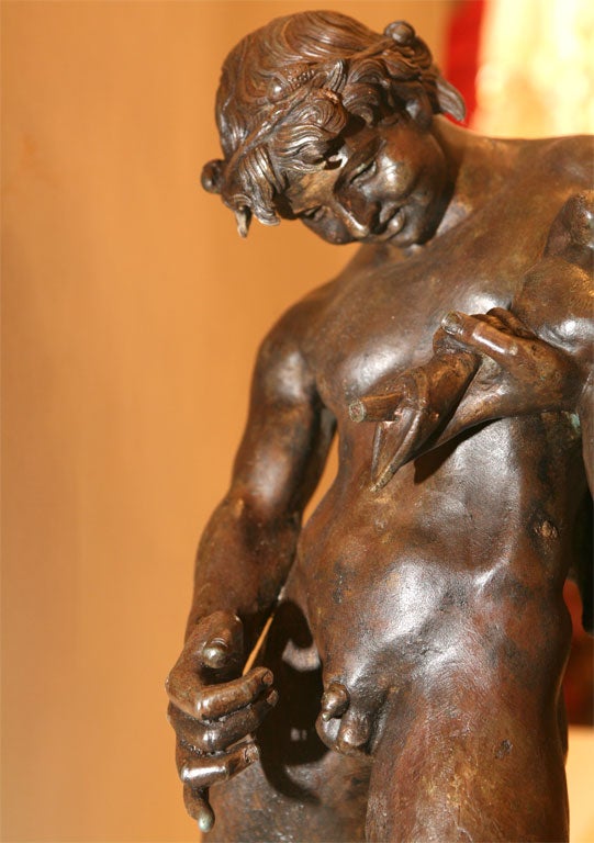 Bronze of young Faun with Wine sack 2