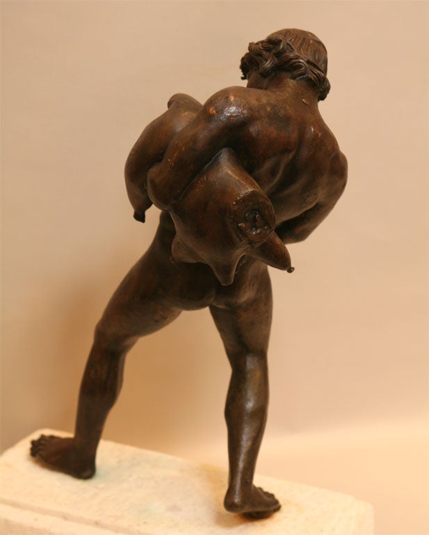 Bronze of young Faun with Wine sack 4