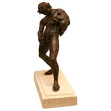 Bronze of young Faun with Wine sack