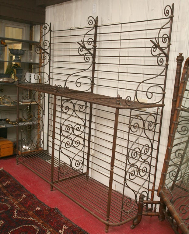 This is an authentic French baker's rack suitable for a large country kitchen or commercial use.  Has 2 additional glass shelves, not shown.  More can be added.  Please ask for additional photos if interested.

Keywords:  sideboard, server,