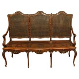C. 1880 French  Carved Walnut Double Cane Settee