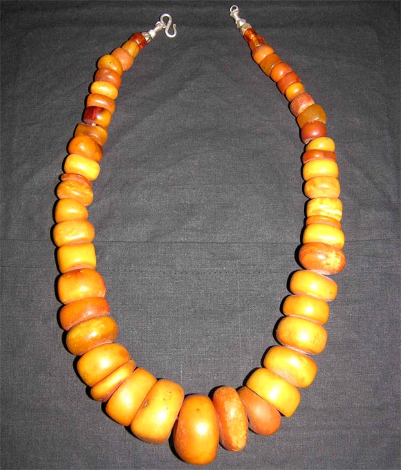 Amber Necklace with 19th century collection of Berber tribe beads and silver clasp.