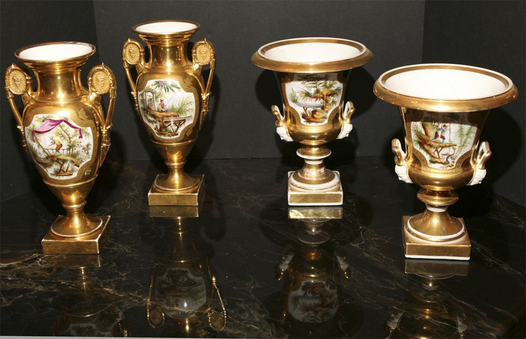 This very finely painted set of Old Paris vases is perfect to decorate a mantel or large server. The painting all by the same hand is done in the chinoiserie style and of the best quality. The gilding is also in a good state with little ware. The