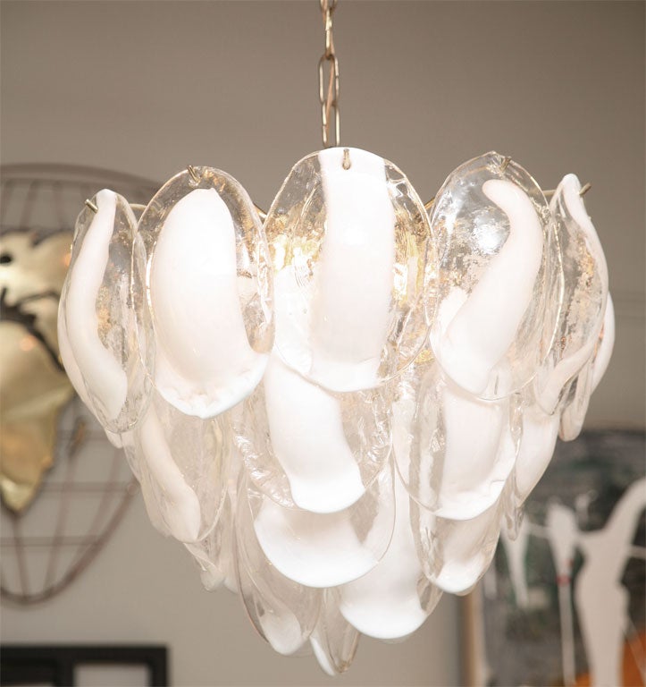 Stunning Mazzega five tiered chandelier with gorgeous thick clear and white blown glass crystals overlapping to form 