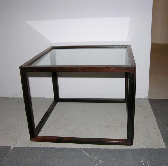 A pair of Minimalist Brazilian rosewood open frame glass topped occasional tables. Denmark, circa 1960.