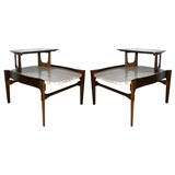 A Pair of Italian Wood and Travertine End Tables.