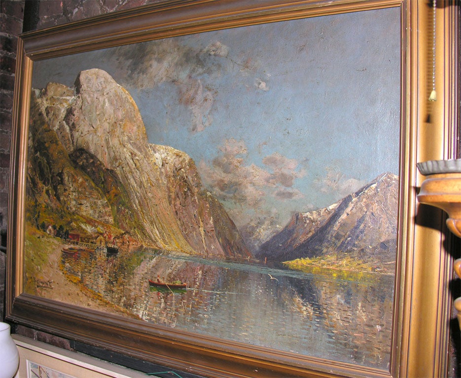Oil on canvas in giltwood frame of a fjord landscape signed J.Holmstedt (1843-1901).
