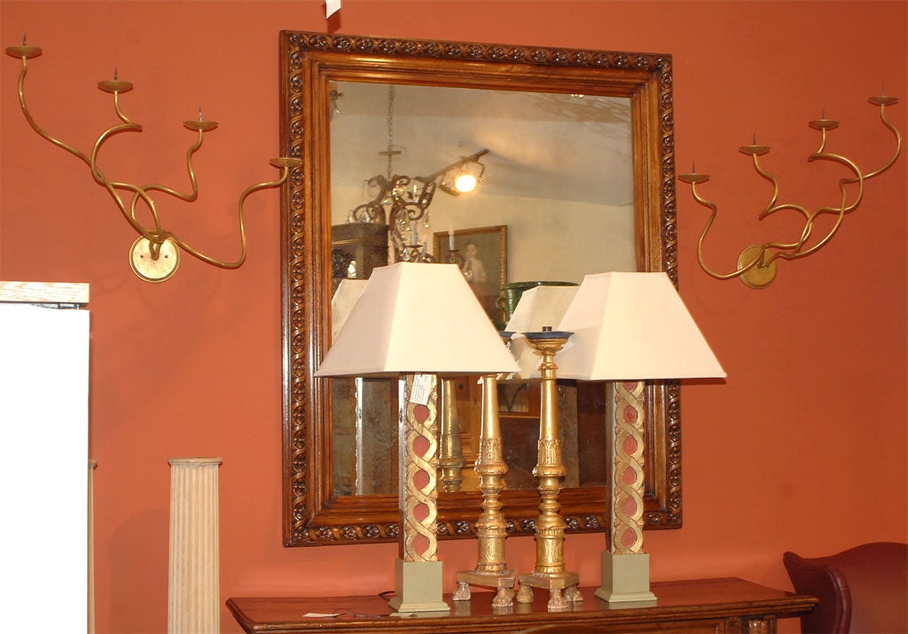 A very decorative large pair of Michael Taylor designed water gilt sconces.