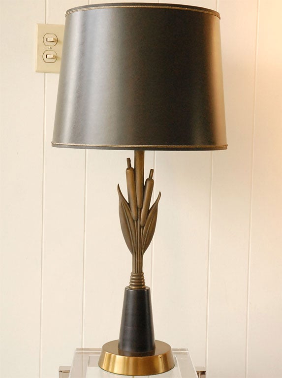 A mid century cattails lamp on a brass base. Cattails have a bronze finish. Custom black shade with fine metallic detail. Shade is 14