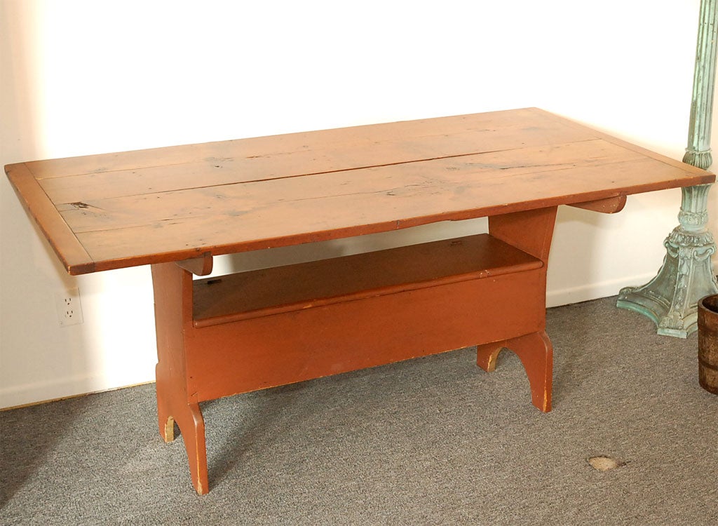19THC Original red painted base with a natural scrub top surface . The condition is very good. The table is sturdy and strong.
