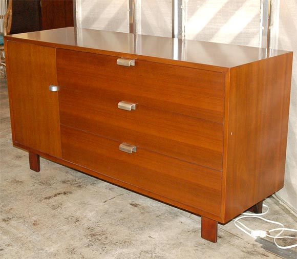 George Nelson cabinet for Herman Miller.  Three drawers, 2 adjustable shelves, original hardware, and foil label.***Contact Information: AOL (American Online) users may experience difficulties sending emails to us or receiving emails from us. If you