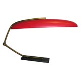 Graceful 1950's Italian desk lamp with painted metal base.