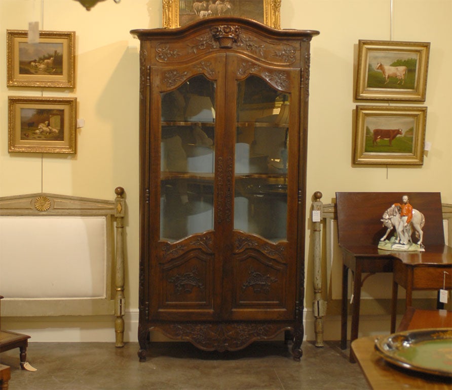 French glass door cabinet with  shaped shelves.later paint inside cabinet. glass replaced on doors.