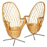 Wicker pair of armcahirs, in the style of J.A. Motte